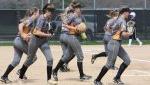 softball players running across diamond